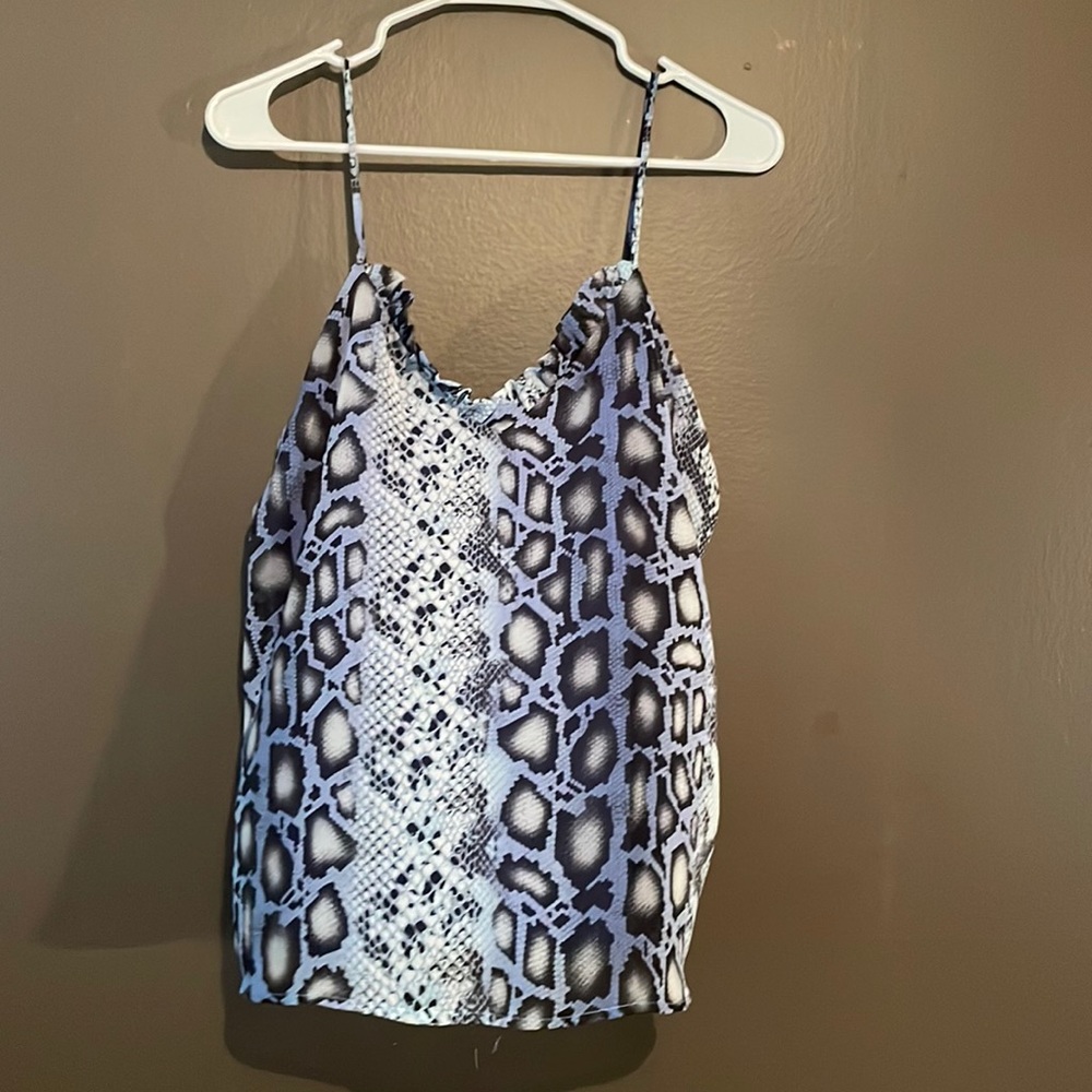 Adrienne brand tank to wear alone or under a jacket.  Lined.  NON adj straps